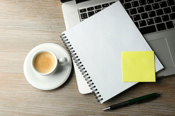 Notebook on laptop keyboard — Stock Photo, Image