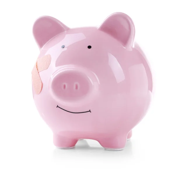 Piggy bank met zelfklevend verband — Stockfoto