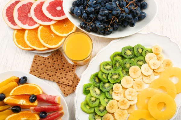 Fruits on light wooden background. healthy eating concept. — Stock Photo, Image