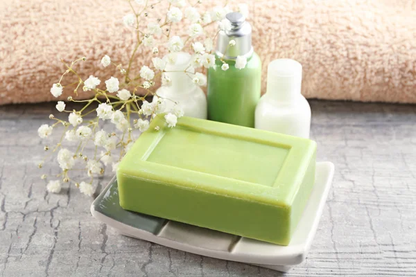 Soap on a dish with bottles