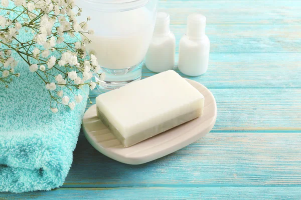 Soap on wooden background