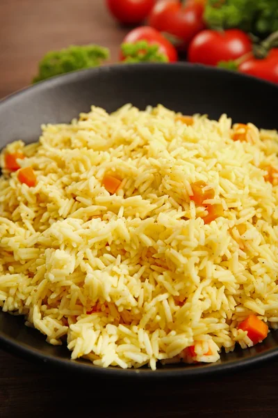 Reiskompott mit einer Karotte — Stockfoto