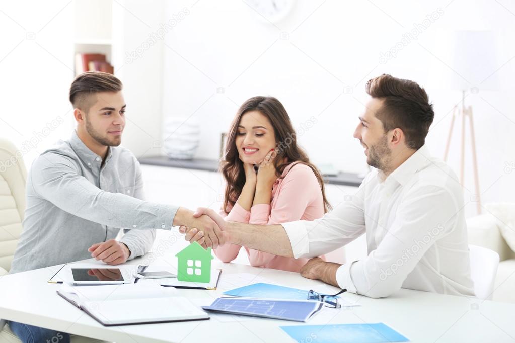 Estate agent with couple