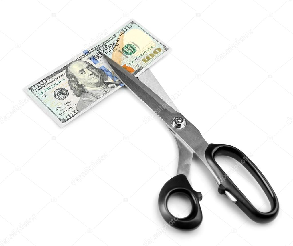 Scissors cut dollar banknote