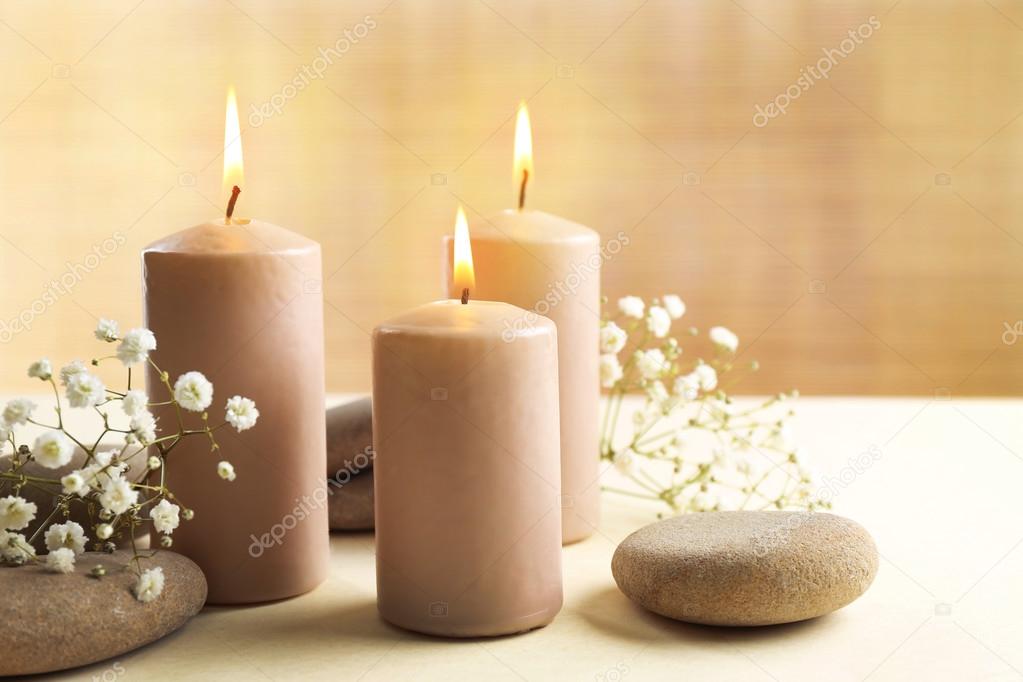 Flowers with lighted candles 