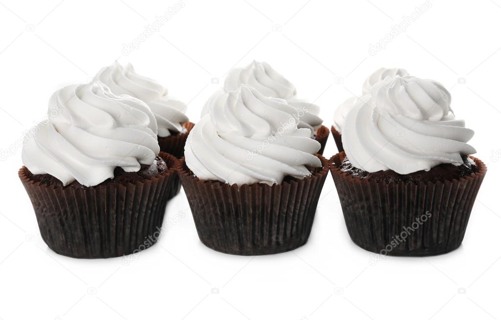 Tasty cupcakes isolated on white background