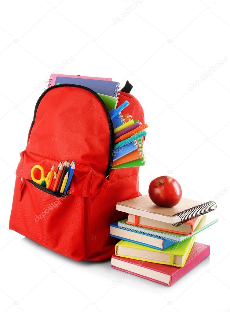 Red backpack with books and apple