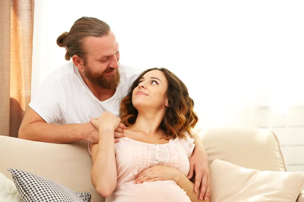 Husband takes care about his pregnant woman — Stock Photo, Image