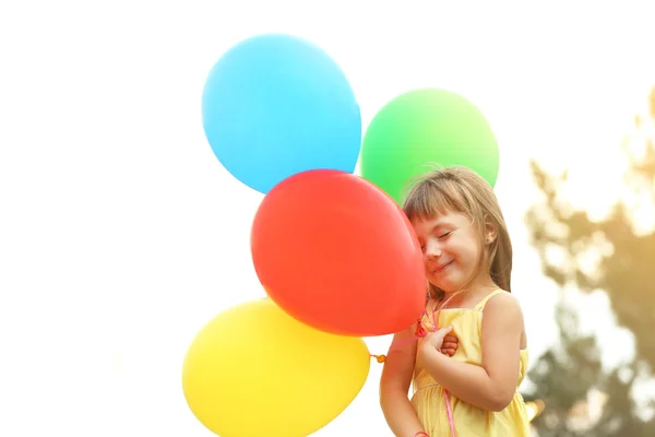 Niña con globos — Foto de Stock