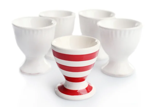 赤と白のストライプのエッグカップ、白で隔離 — ストック写真