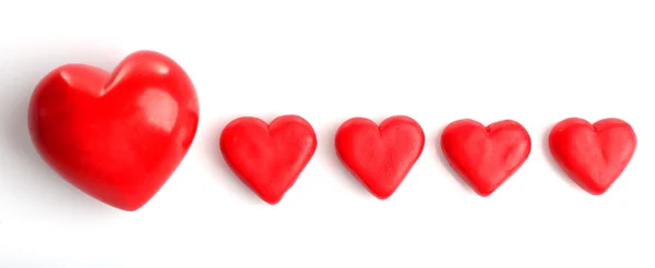 Five red hearts, isolated — Stock Photo, Image