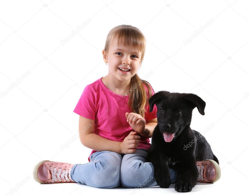 Little girl with puppy