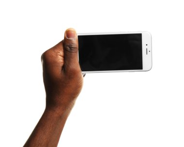 El ele tutuşan cep telefonu