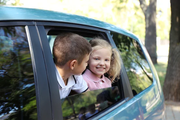 Smiling children in car — Stock Photo, Image