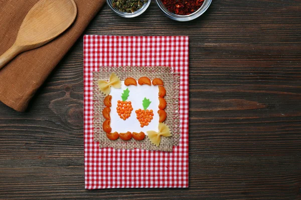 Decorated cookbook on wooden background — Stock Photo, Image