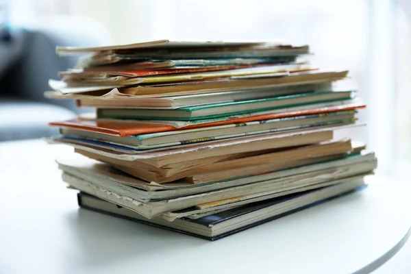 Pile of old books on white table — Stock Photo, Image