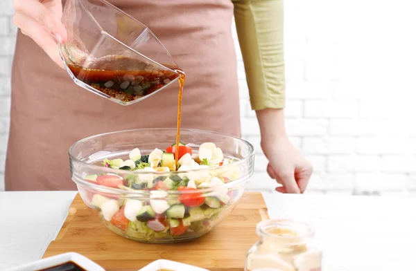 Preparing sauce for salad — Stock Photo, Image