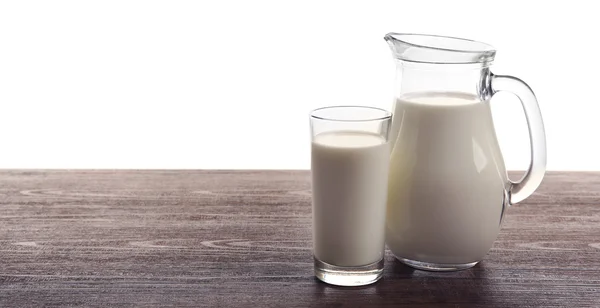 Mjölk i glas och i burk — Stockfoto