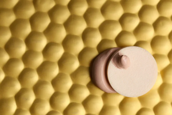 Makeup sponge with liquid foundation — Stock Photo, Image