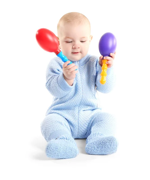 Adorable bebé con juguete musical de plástico —  Fotos de Stock