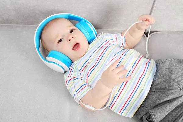 Cute baby with headphones — Stock Photo, Image