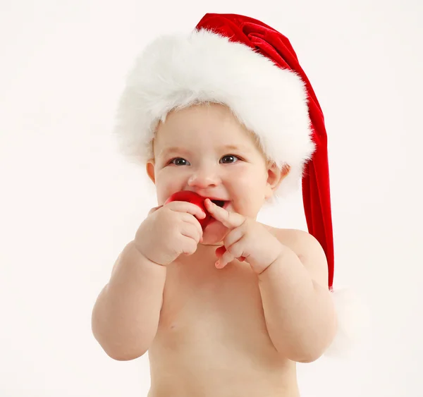 Söt baby med jultomten hatt — Stockfoto