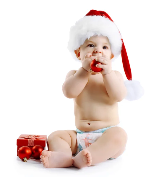 Söt baby med jultomten hatt — Stockfoto