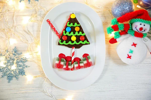 Delicious Christmas cookie with jelly on table — Stock Photo, Image