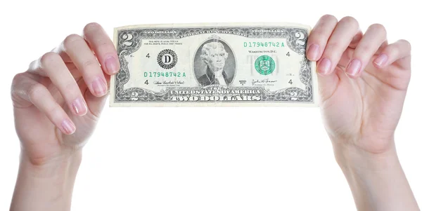 İki dolarlık banknot, üzerinde beyaz izole holding eller — Stok fotoğraf