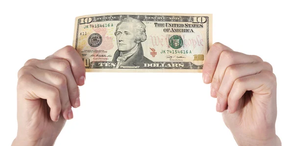 Mani in possesso di banconota da dieci dollari, isolata su bianco — Foto Stock