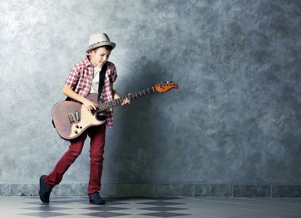 Boy playing guitar — Stock Photo, Image