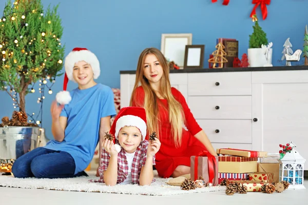 Happy children in Christmas room — Stock Photo, Image