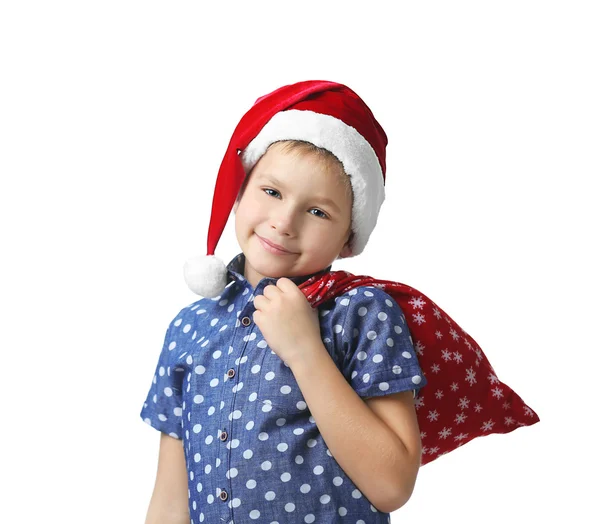 Niño en Santa sombrero con bolsa — Foto de Stock