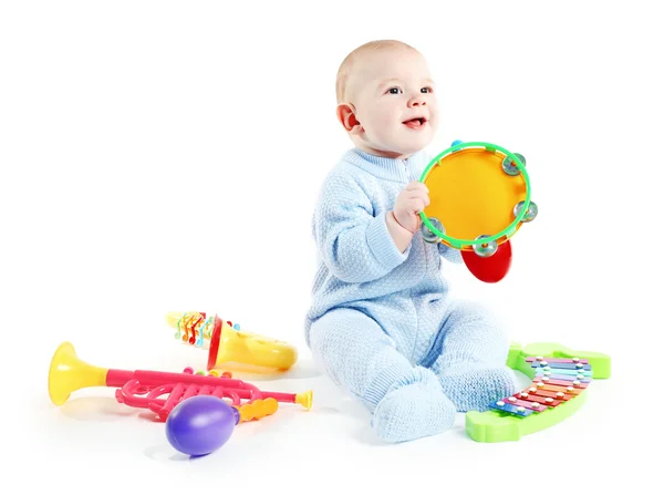 Bebê adorável com brinquedos — Fotografia de Stock