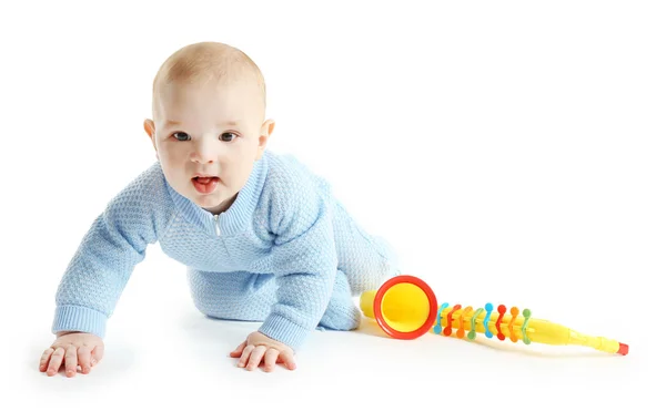 Bebê adorável com saxofone colorido de plástico — Fotografia de Stock