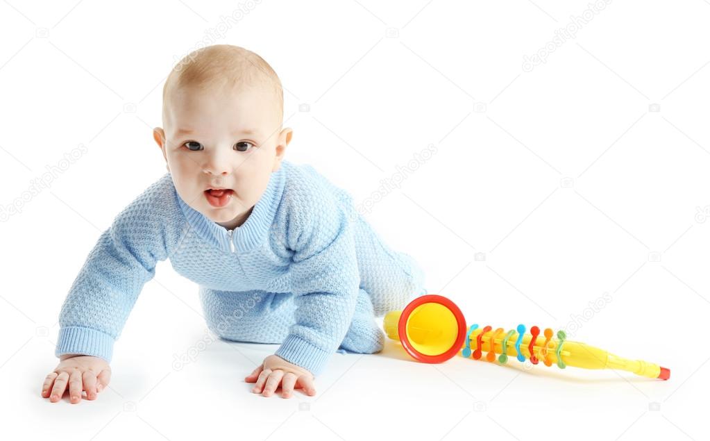 Adorable baby with plastic colourful saxophone