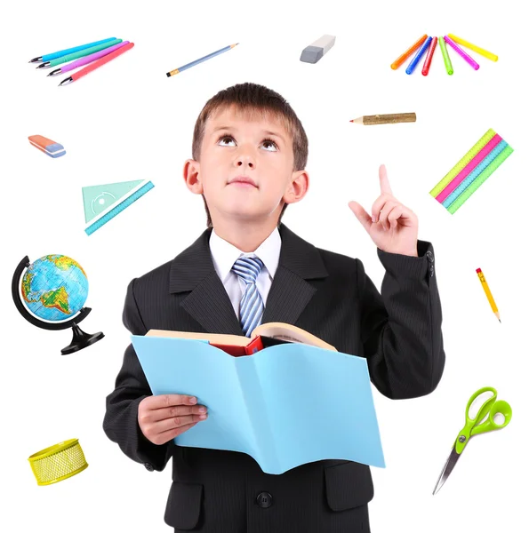 Schattig schooljongen met benodigdheden — Stockfoto