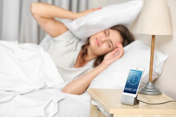 Young woman waking up — Stock Photo, Image