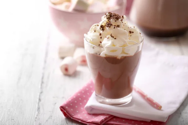 Glass of chocolate milk on table close-up — Stock Photo, Image