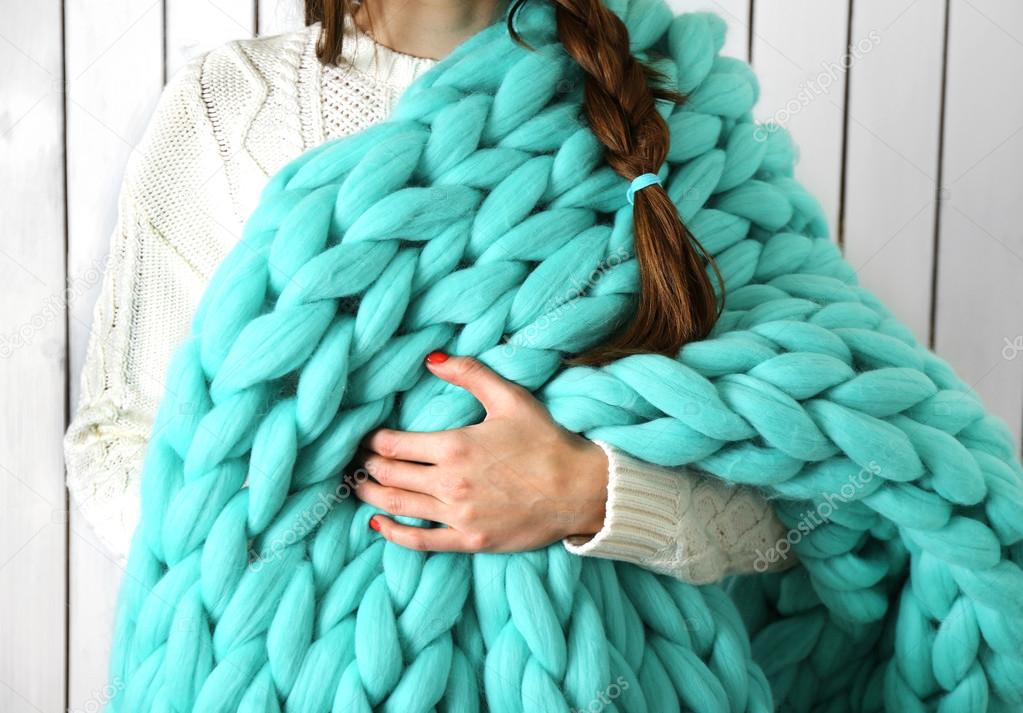 Woman wrapped in blanket