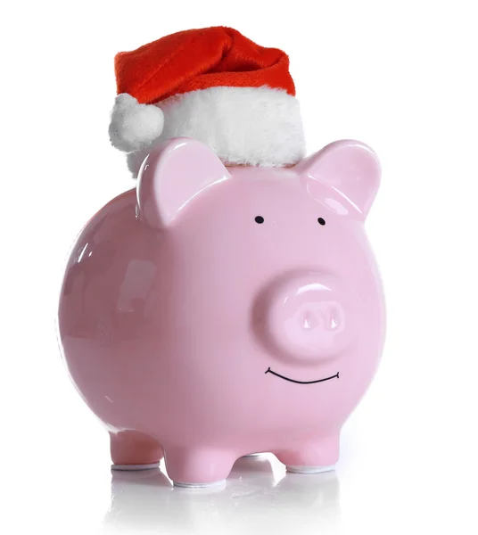 산타 모자와 함께 돼지 저금통 — 스톡 사진