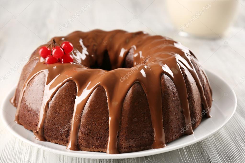 Chocolate cake with a bottle of milk