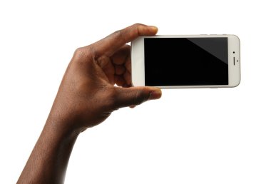 El ele tutuşan cep telefonu