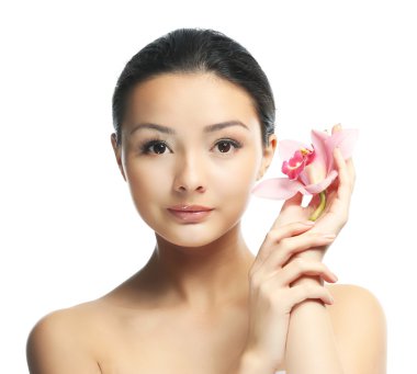 Orkide çiçekli güzel kadın.