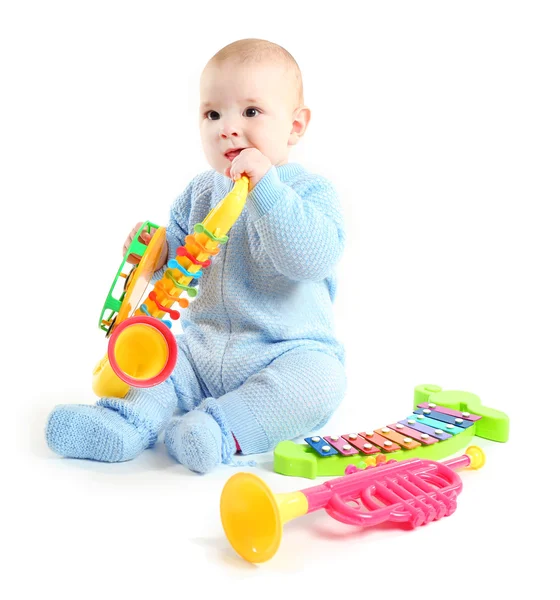 Очаровательный ребенок с игрушками — стоковое фото