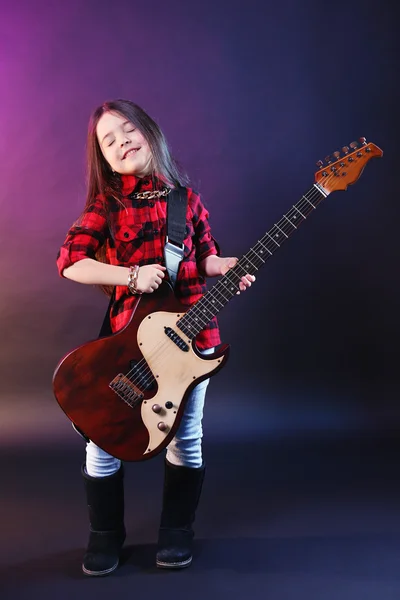 Little rock star playing guitar — Stock Photo, Image