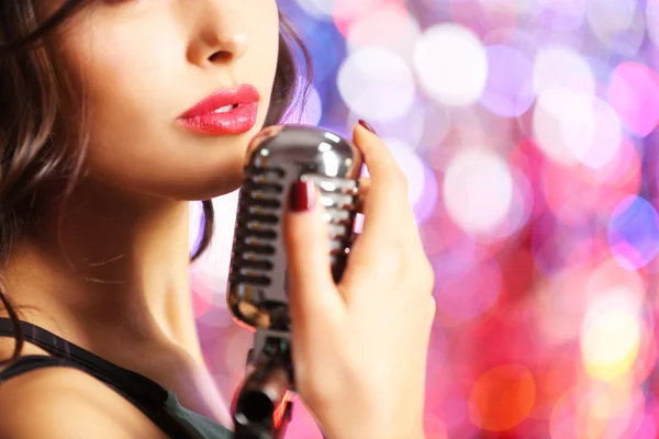 Young cute woman with retro microphone — Stock Photo, Image