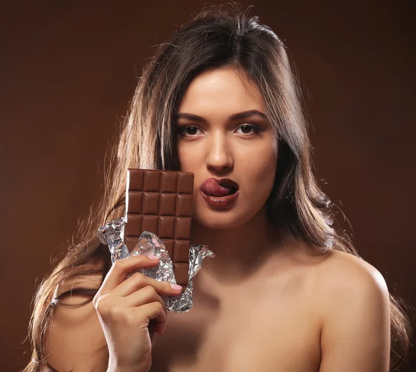 Young woman with chocolate — Stock Photo, Image