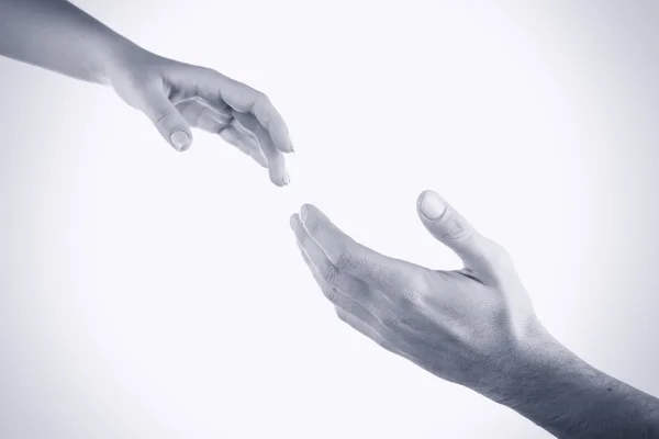 Hands reaching toward each other — Stock Photo, Image