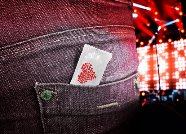 Condom in pocket of jeans — Stock Photo, Image